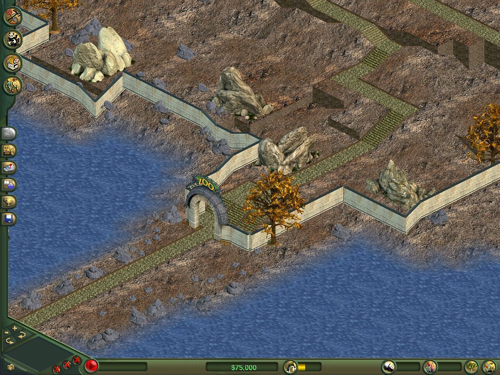 Rocky terrain, water and the zoo entrance with its stone walls.